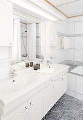 Image showing Light bathroom with two sinks