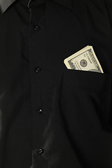 Image showing Dollars in pocket of coat