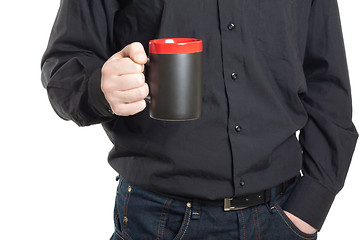 Image showing Businessman hand holding a cup of coffee on white