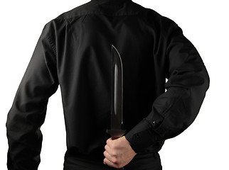 Image showing standing man in black with knife for backs