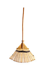 Image showing wooden rake isolated on the white background