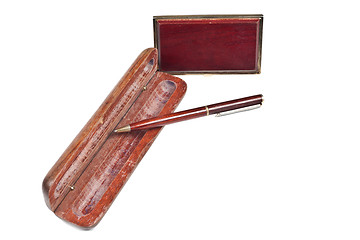 Image showing Mahogany ball pen in an opened wooden case