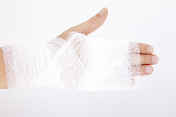 Image showing bandaged hand on white background