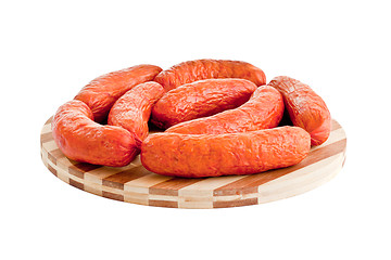 Image showing delicious sausages on board