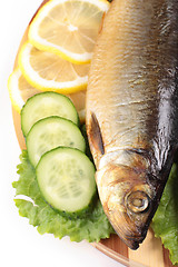 Image showing fish with lemon and vegetables