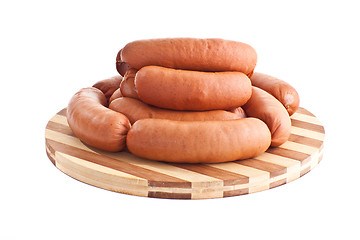 Image showing delicious sausages on board