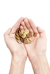 Image showing Male hands holding coins isolated on white