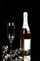 Image showing Champagne - bottle and glass