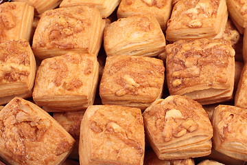 Image showing buns on wooden plate