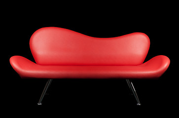 Image showing Red sofa on black background