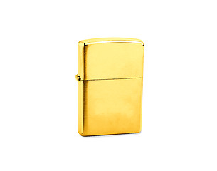 Image showing golden lighter on a white background