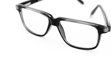 Image showing Black glasses over white background