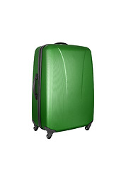 Image showing green convenient suitcase on castors on a white background