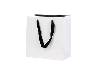 Image showing White beamless paper-bag with cords.