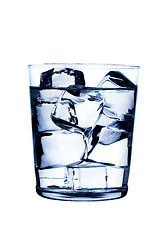 Image showing glass with ice cubes on glossy background