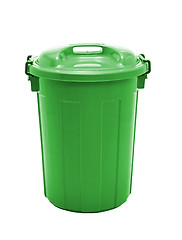 Image showing A green plastic garbage bin isolated over white background