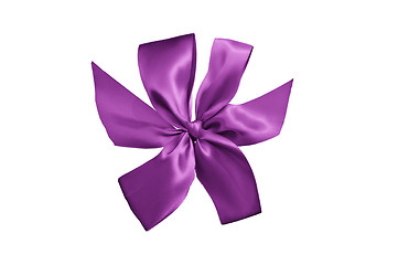 Image showing purple gift ribbon with bow isolated on white background