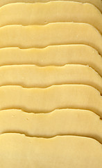 Image showing slices cheese on white background