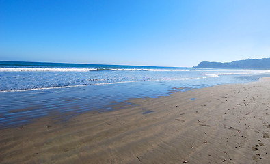 Image showing tropical beach with blue sky. travel holiday background