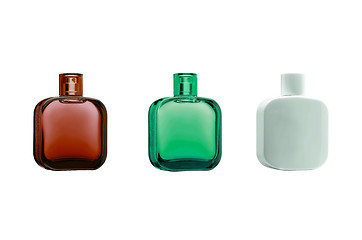 Image showing three perfume bottles with reflections