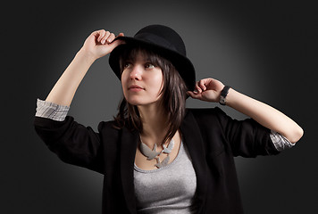 Image showing Elegant woman in black hat