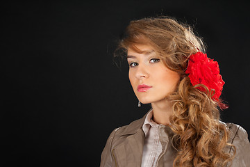 Image showing beautiful attractive girl with red bow on hair