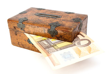 Image showing money partly in wooden box