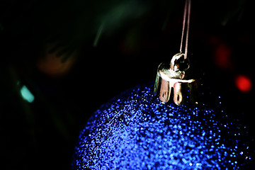 Image showing Christmas ornaments on tree.