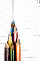 Image showing Color pencil and agenda