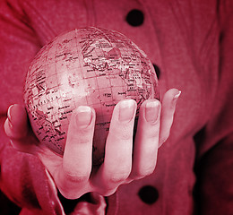 Image showing Globe in a girl's hands