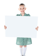 Image showing Pretty girl holding blank white poster