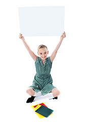 Image showing Attractive girl displaying whiteboard