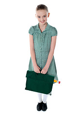Image showing Full shot portrait of smiling school girl