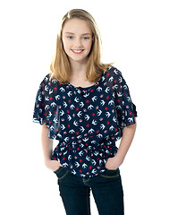 Image showing Stylish girl posing with hands in pocket