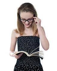 Image showing Beautiful girl reading book