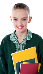 Image showing Close up of a smiling school girl