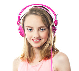 Image showing Attractive girl wearing pink headphones