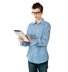 Image showing Boy holding electronic tablet