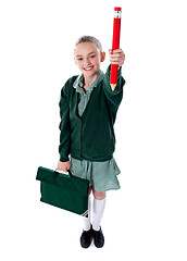 Image showing Full length shot of school girl with bag