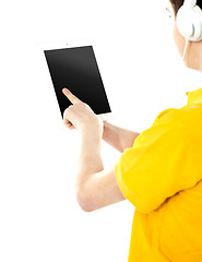 Image showing Boy operating touch pad device