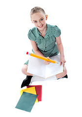Image showing Student girl doing homework