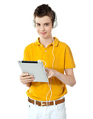 Image showing Smart boy using touch screen device