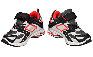 Image showing Teens sneakers with red elements