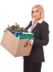 Image showing young business woman moving personal things