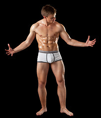 Image showing young bodybuilder demonstrates posture