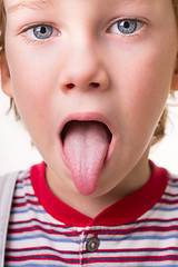 Image showing toddler shows tongue