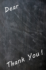 Image showing Thank you written with chalk on blackboard with copy space for extra text 