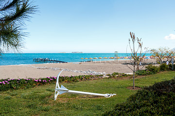 Image showing empty beach with anchor