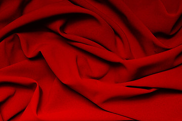 Image showing The folds of a bright red cloth. Abstract Background