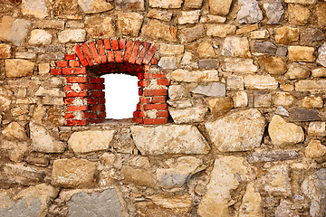 Image showing Old wall of castle with a window